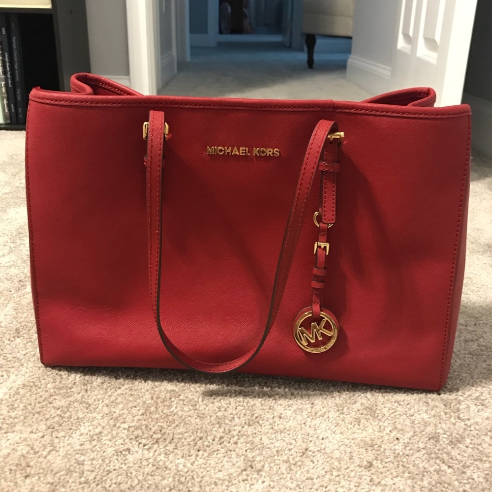 Michael Kors red handbag